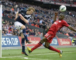 Taylor (in the dark playing strip) pictured in action at Wembley. Picture courtesy of Millwall Football Club