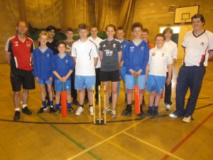 OWZAT: Kate (centre) lines up with excited pupils before putting them through their paces