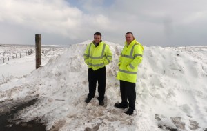 P2 snow way Oldham's head of highways Craig Dale, right & colleague Stephen Aikman at the A635 snow wall