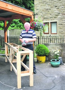 HANDS ON: Peter Archer with one of the beer stillages he has built for the festival