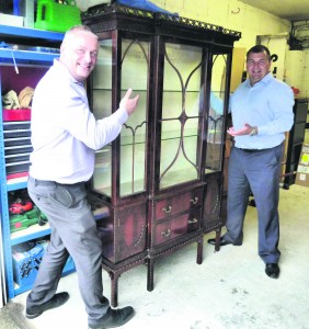 Flog it: Saddleworth Round Table chairman Ian Eardley with Dave MacDougall and the cabinet