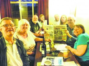 QUIZZERS: The DDs read the Independent in The Bridge Inn at Ruswarp, North Yorkshire. L-R: Steve Schofield, Sylvia Tomlinson, Geoff Iles, Jenny Cordingley, Phil Cordingley, Kathy Tomlinson, Neil Tomlinson and Janet Iles