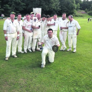MAN OF THE MATCH: Saddleworth's Steve Taylor with the Moore Cup winning team
