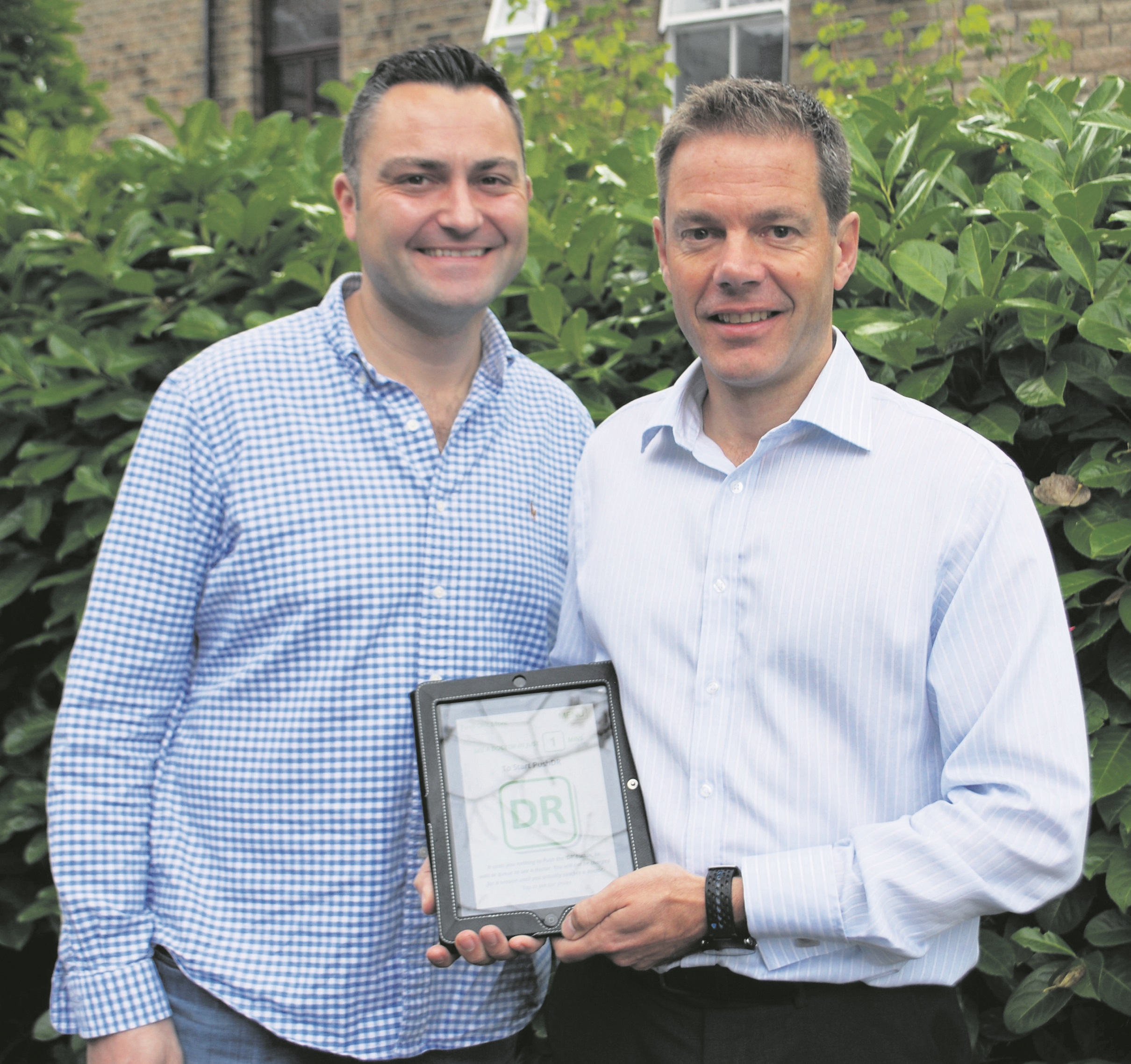 P7 GP app Dr Ian Watson with Eren Ozagir