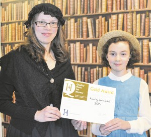 Mrs Liz Oliver and Nina Jones with the award