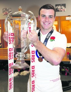 "PARIS, FRANCE - MARCH 19: George Ford of England holds the Six Nations trophy after their victory during the RBS Six Nations match between France and England at the Stade de France on March 19, 2016 in Paris, France. (Photo by David Rogers - RFU/The RFU Collection via Getty Images)"