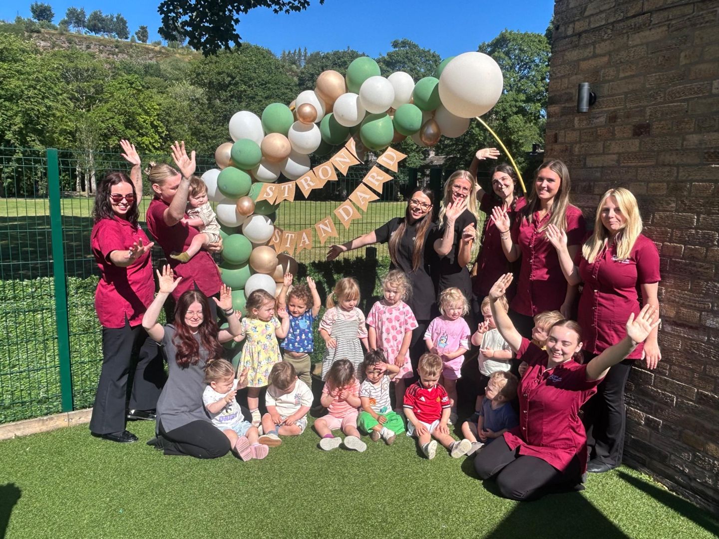 Staff and youngsters at Swan Meadow celebrating their 'Strong Standard' Ofsted result